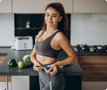 Woman measuring waist